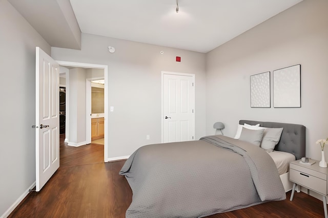 500 Grant St Unit 1711, Minneapolis, MN 55404 - bedroom featuring baseboards and dark wood-style flooring
