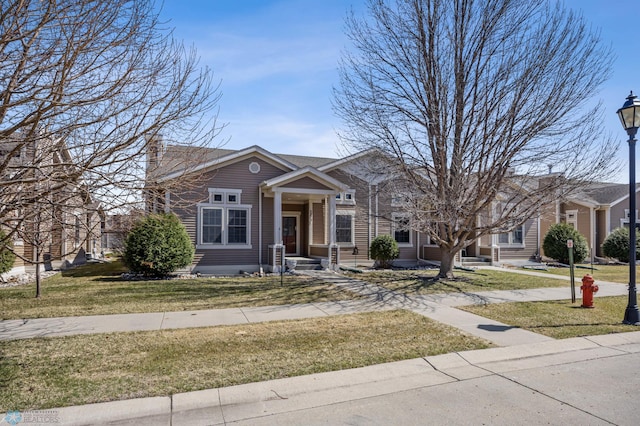 view of front of home featuring a front lawn