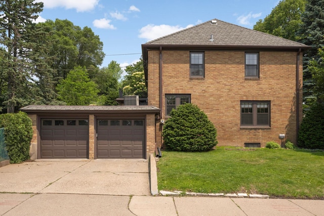 5352 15th Ave S, Minneapolis, MN 55417 - view of side of property featuring a garage, a yard, and brick siding