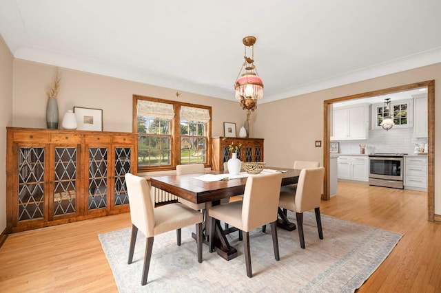 5352 15th Ave S, Minneapolis, MN 55417 - dining space with light wood finished floors and a chandelier
