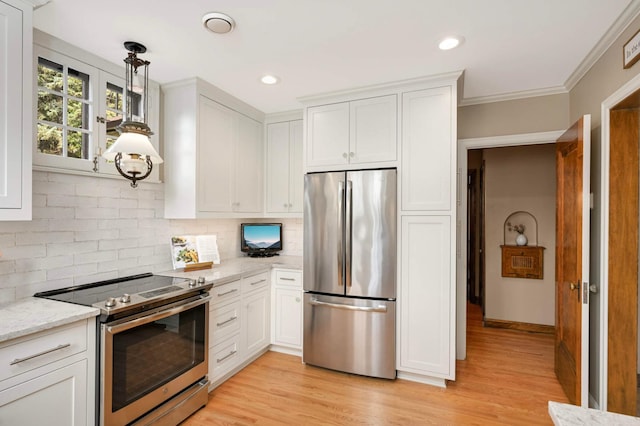 5352 15th Ave S, Minneapolis, MN 55417 - kitchen with stainless steel appliances, decorative backsplash, white cabinetry, light wood-style floors, and light stone countertops