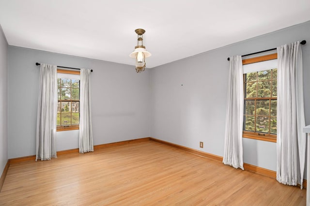 5352 15th Ave S, Minneapolis, MN 55417 - empty room with light wood-style flooring and baseboards