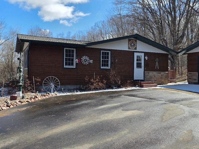 single story home with entry steps
