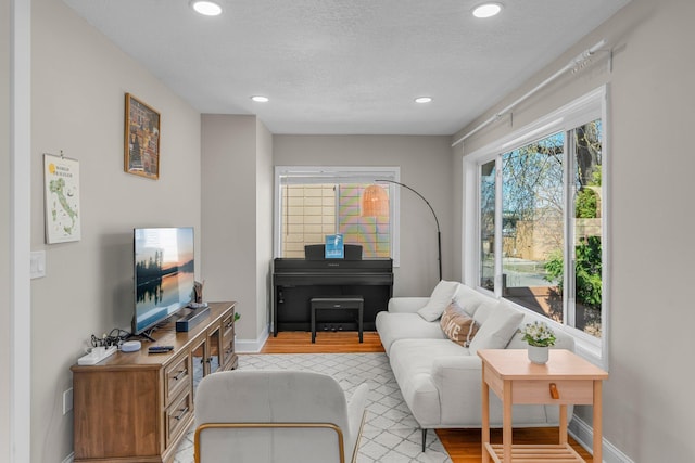 1332 Jersey Ave S, Saint Louis Park, MN 55426 - living room with recessed lighting, a textured ceiling, and baseboards