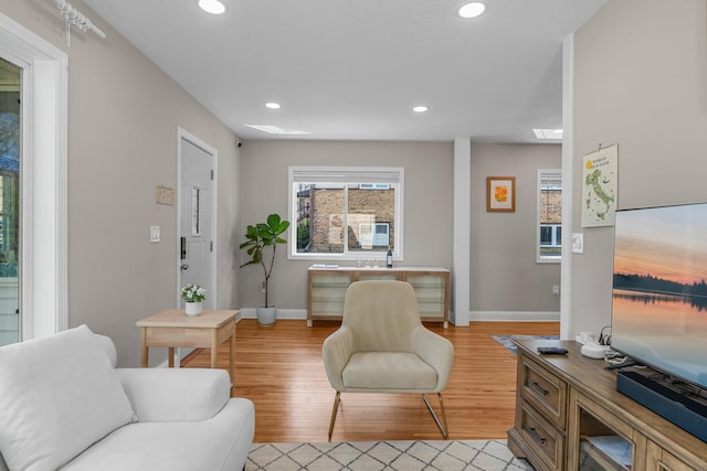 1332 Jersey Ave S, Saint Louis Park, MN 55426 - sitting room featuring recessed lighting, light wood-type flooring, and baseboards
