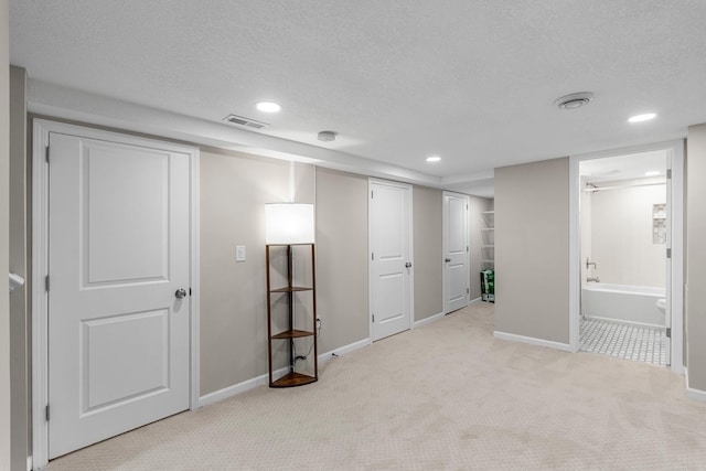 1332 Jersey Ave S, Saint Louis Park, MN 55426 - unfurnished bedroom with light colored carpet, baseboards, visible vents, and recessed lighting