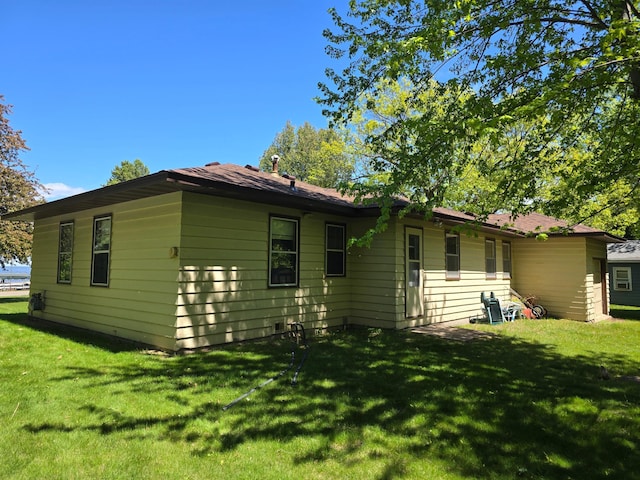 16099 Twilight Rd, Kathio Twp, MN 56359 - view of property exterior featuring a lawn