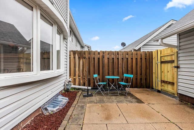 7986 Lad Pkwy, Brooklyn Park, MN 55443 - view of patio with a gate