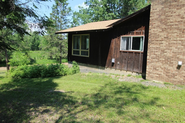 42491 432nd Ln, Aitkin, MN 56431 - view of side of home featuring a lawn