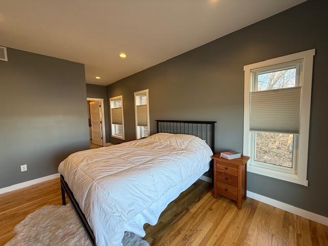 817 2nd St N, Brownsville, MN 55919 - bedroom with recessed lighting, baseboards, and light wood-style flooring