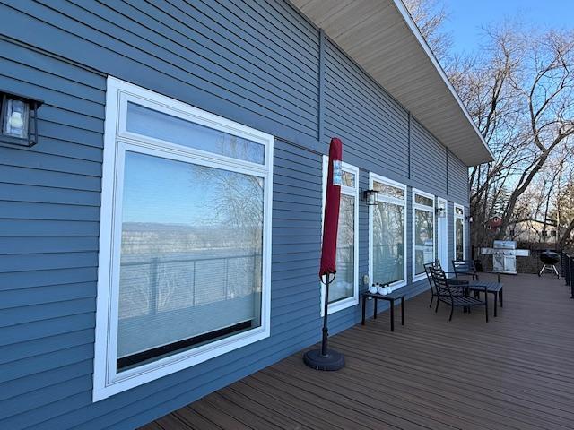 817 2nd St N, Brownsville, MN 55919 - wooden deck with area for grilling