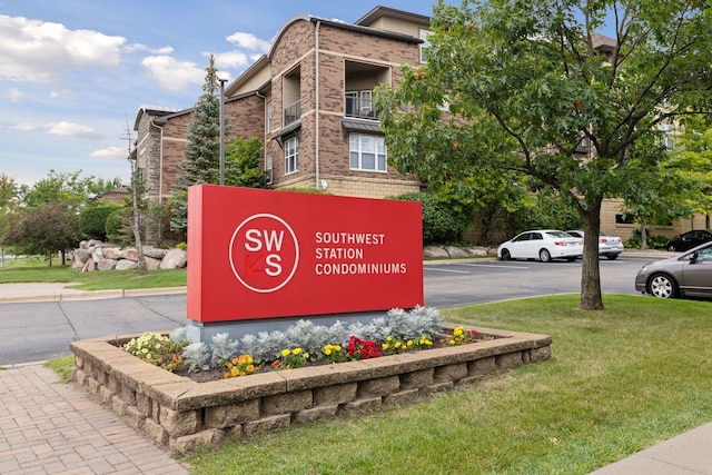 13560 Technology Dr Unit 1210, Eden Prairie, MN 55344 - community / neighborhood sign with uncovered parking and a lawn