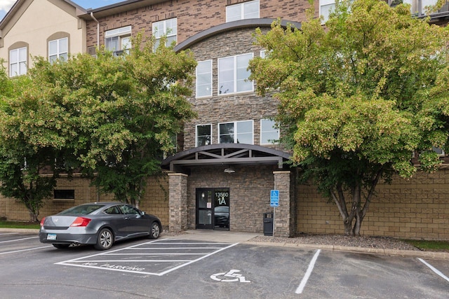 13560 Technology Dr Unit 1210, Eden Prairie, MN 55344 - view of building exterior with uncovered parking