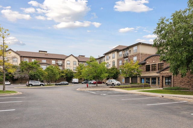 13560 Technology Dr Unit 1210, Eden Prairie, MN 55344 - view of building exterior featuring uncovered parking