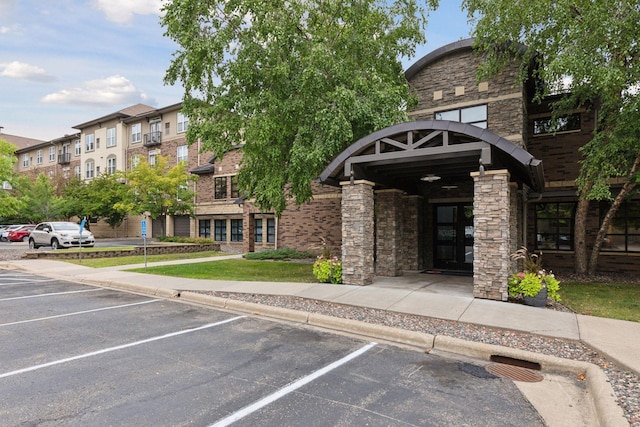13560 Technology Dr Unit 1210, Eden Prairie, MN 55344 - view of building exterior with uncovered parking