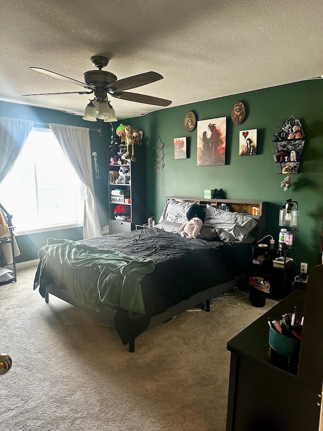 7048 Park Dr, Savage, MN 55378 - bedroom featuring carpet floors, ceiling fan, and a textured ceiling