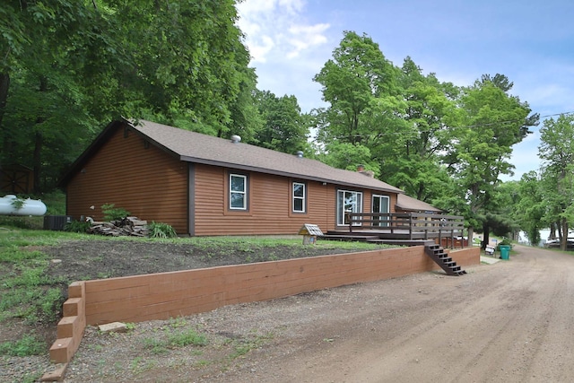 27672 Little Whitefish Rd, Garrison, MN 56450 - view of front facade featuring a wooden deck