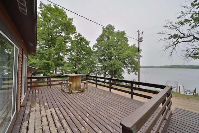 27672 Little Whitefish Rd, Garrison, MN 56450 - wooden deck with a water view