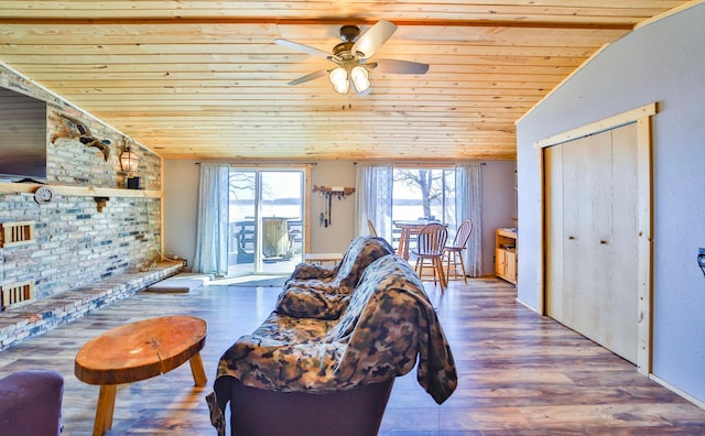 27672 Little Whitefish Rd, Garrison, MN 56450 - living area with wood ceiling, a ceiling fan, and wood finished floors