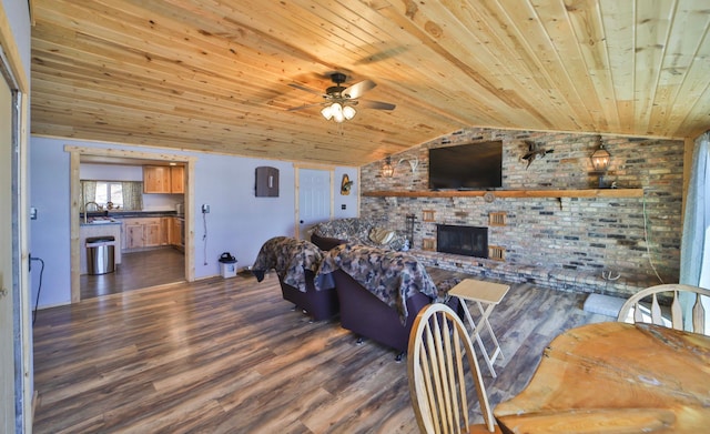 27672 Little Whitefish Rd, Garrison, MN 56450 - living room featuring wood ceiling, a ceiling fan, lofted ceiling, dark wood finished floors, and a fireplace