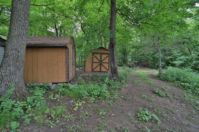 27672 Little Whitefish Rd, Garrison, MN 56450 - view of yard with a forest view
