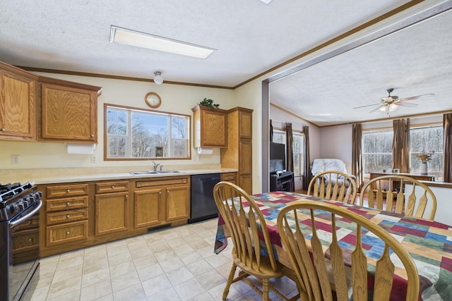 42479 US-71, Laporte, MN 56461 - kitchen featuring dishwasher, a textured ceiling, gas stove, brown cabinetry, and a sink