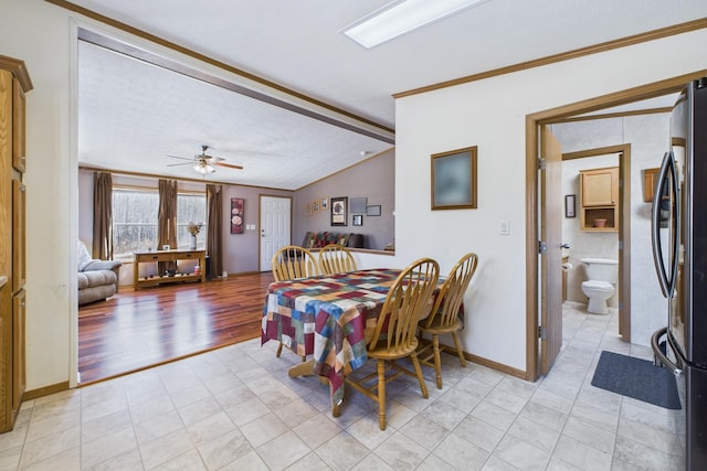 42479 US-71, Laporte, MN 56461 - dining space with lofted ceiling, a ceiling fan, baseboards, light tile patterned flooring, and ornamental molding