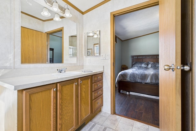 42479 US-71, Laporte, MN 56461 - ensuite bathroom with crown molding, vanity, and tile patterned floors