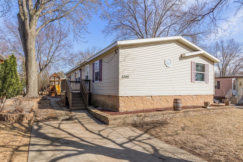 8380 Atlas W, Inver Grove Heights, MN 55077 - view of home's exterior featuring crawl space, a wooden deck, and stairs