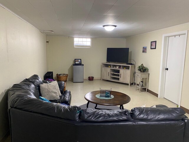 713 Maple Dr, Aurora, MN 55705 - living area featuring tile patterned floors and baseboards