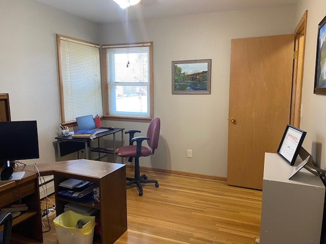 713 Maple Dr, Aurora, MN 55705 - office with baseboards and light wood-style flooring