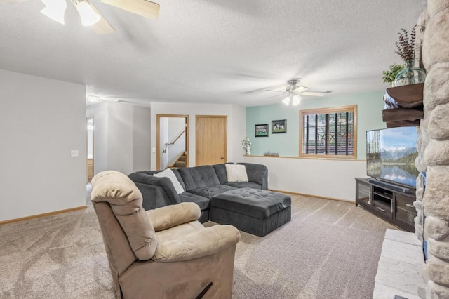108 Serenity Cir, Buffalo, MN 55313 - living room featuring a ceiling fan, light colored carpet, stairs, baseboards, and a textured ceiling