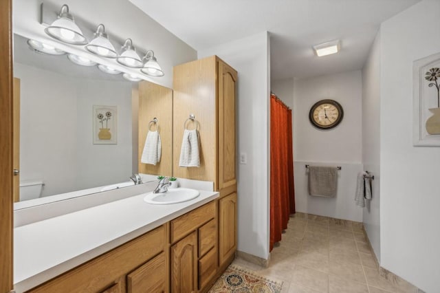 108 Serenity Cir, Buffalo, MN 55313 - bathroom featuring vanity, toilet, tile patterned flooring, and a shower with curtain