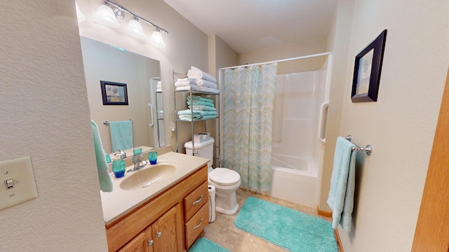 bathroom with vanity, shower / bath combo with shower curtain, and toilet