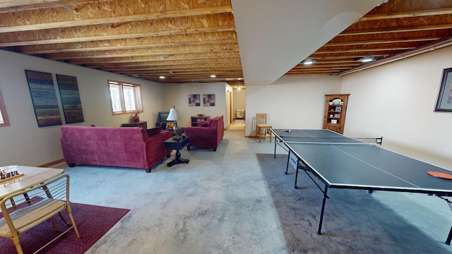 rec room featuring concrete flooring
