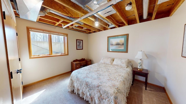 bedroom featuring baseboards and carpet flooring
