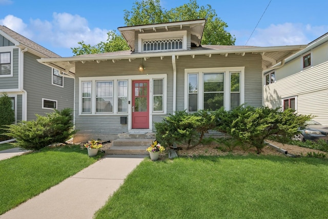4336 Aldrich Ave S, Minneapolis, MN 55409 - bungalow-style house with a front lawn and entry steps