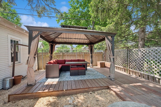 4336 Aldrich Ave S, Minneapolis, MN 55409 - wooden deck with a gazebo, an outdoor living space, and a fenced backyard