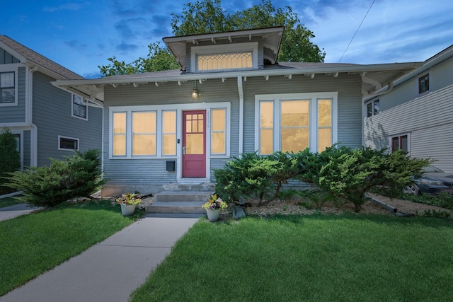 4336 Aldrich Ave S, Minneapolis, MN 55409 - bungalow-style home with entry steps and a front lawn
