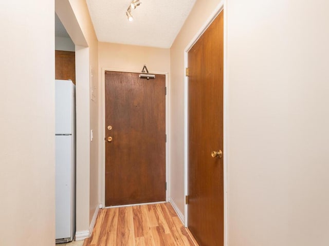 4351 Parklawn Ave Unit 209E, Edina, MN 55435 - hall with light wood-style flooring