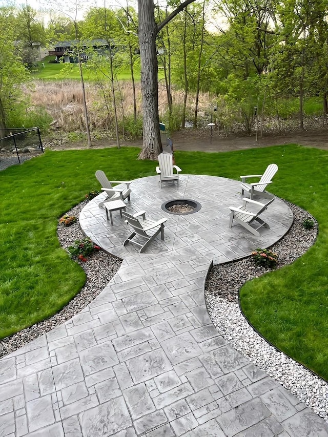 view of patio featuring an outdoor fire pit