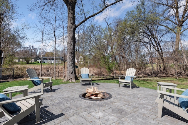 view of patio with an outdoor fire pit