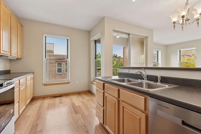 645 1st St Unit 411, Minneapolis, MN 55401 - kitchen with a sink, stainless steel appliances, light wood-style floors, and light brown cabinetry
