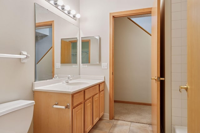 645 1st St Unit 411, Minneapolis, MN 55401 - full bath featuring vanity, toilet, and tile patterned flooring