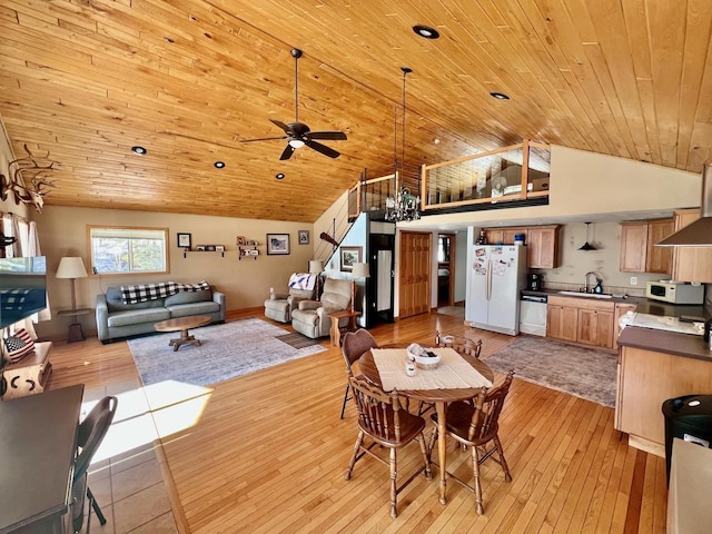 4832 Ambassador Point Ct, Leiding Twp, MN 55771 - dining area featuring wooden ceiling, ceiling fan, light wood-style floors, and high vaulted ceiling