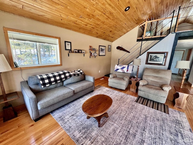 4832 Ambassador Point Ct, Leiding Twp, MN 55771 - living room featuring lofted ceiling, hardwood / wood-style flooring, wood ceiling, and baseboards