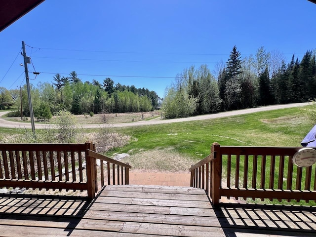 4832 Ambassador Point Ct, Leiding Twp, MN 55771 - wooden terrace with a yard