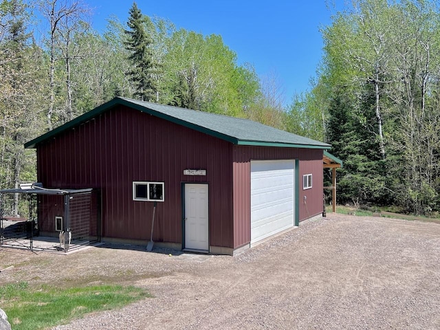 4832 Ambassador Point Ct, Leiding Twp, MN 55771 - detached garage with dirt driveway