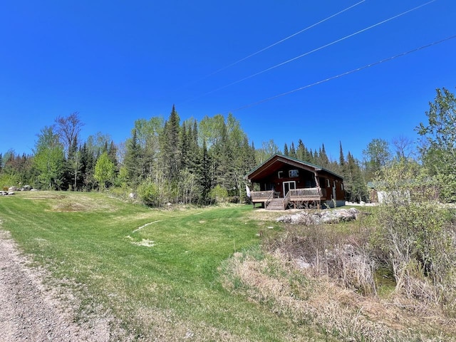 4832 Ambassador Point Ct, Leiding Twp, MN 55771 - view of front of home featuring a deck and a front yard