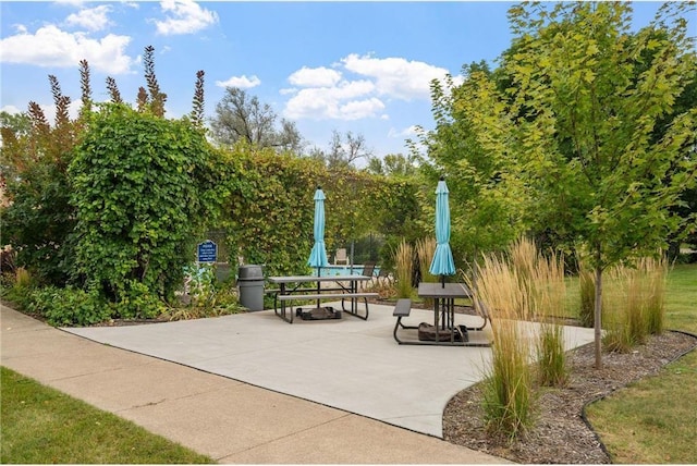 view of home's community with a patio